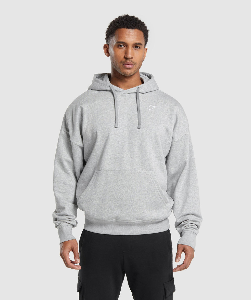 Sudadera con capucha extragrande con escudo