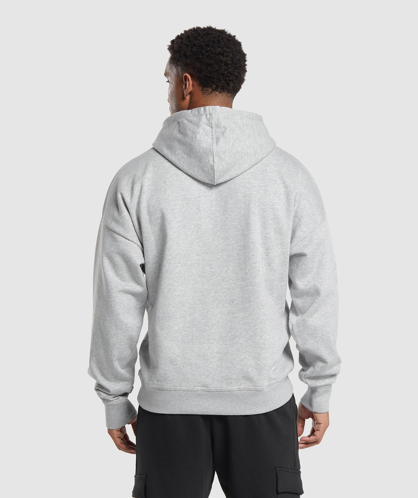 Sudadera con capucha extragrande con escudo