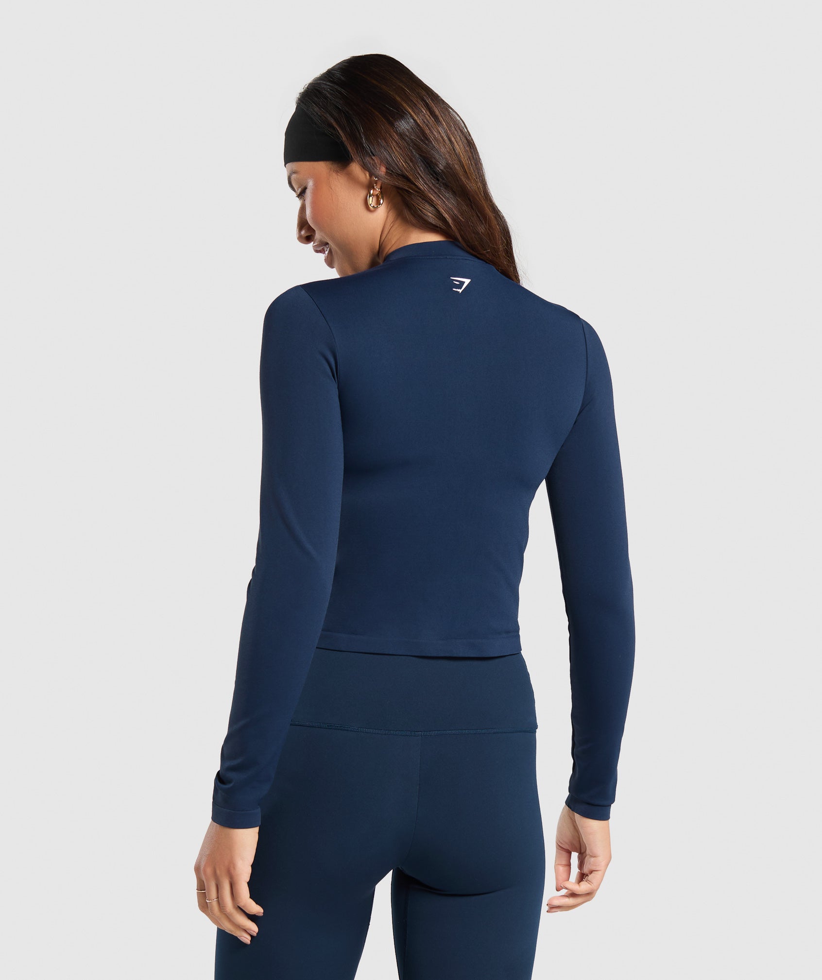 Chaqueta deportiva con cremallera y sin costuras para uso diario