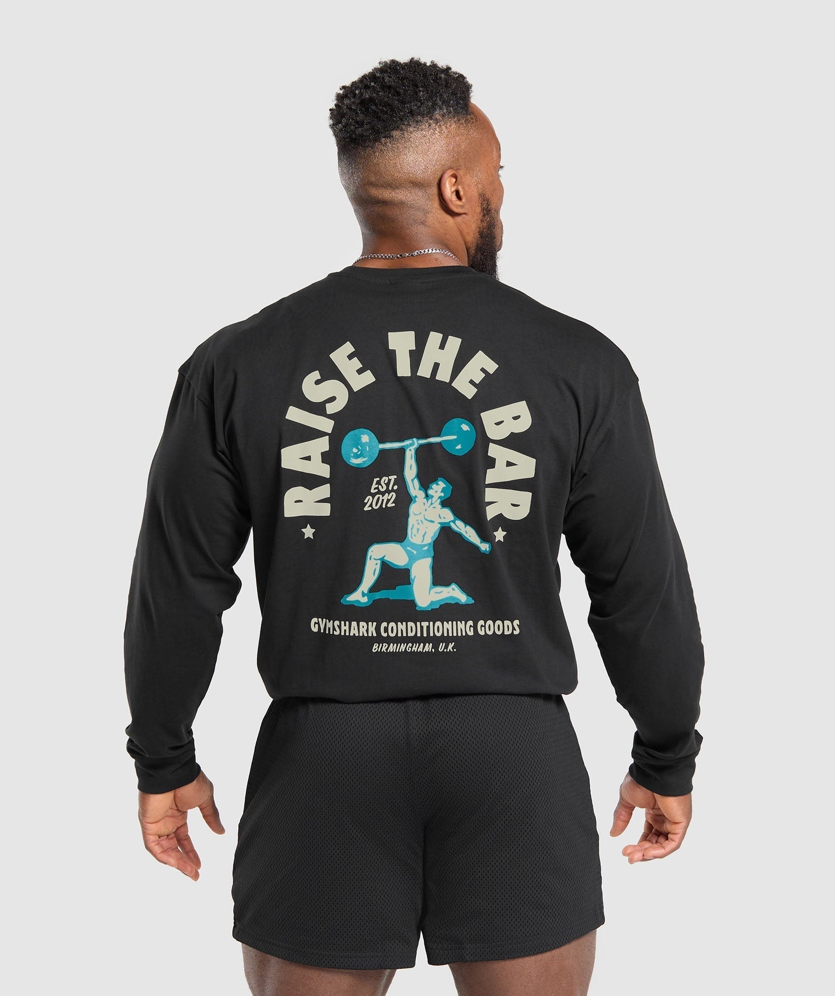 Camiseta de manga larga "Raise The Bar"