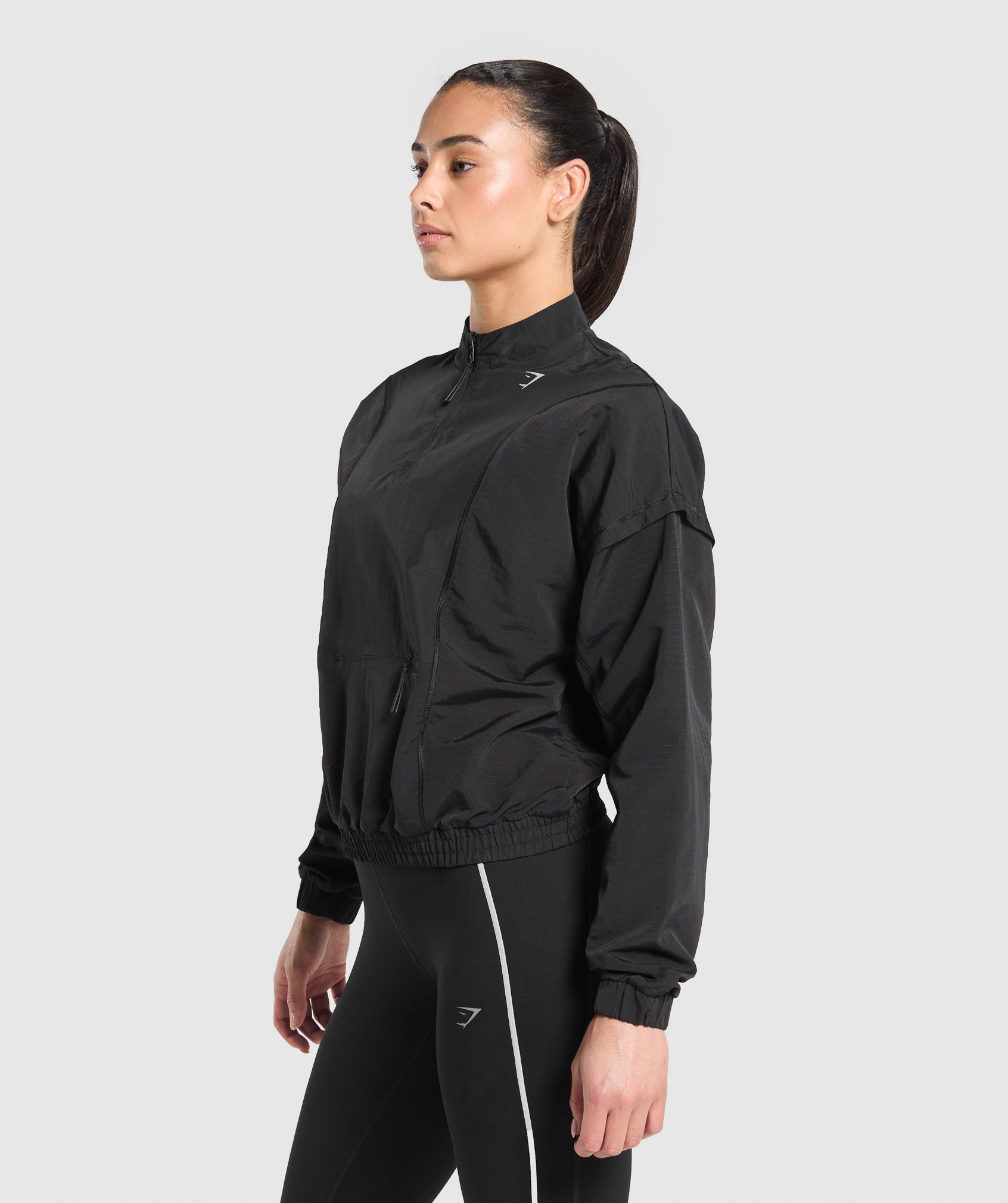Top deportivo con cremallera de 1/4 para correr
