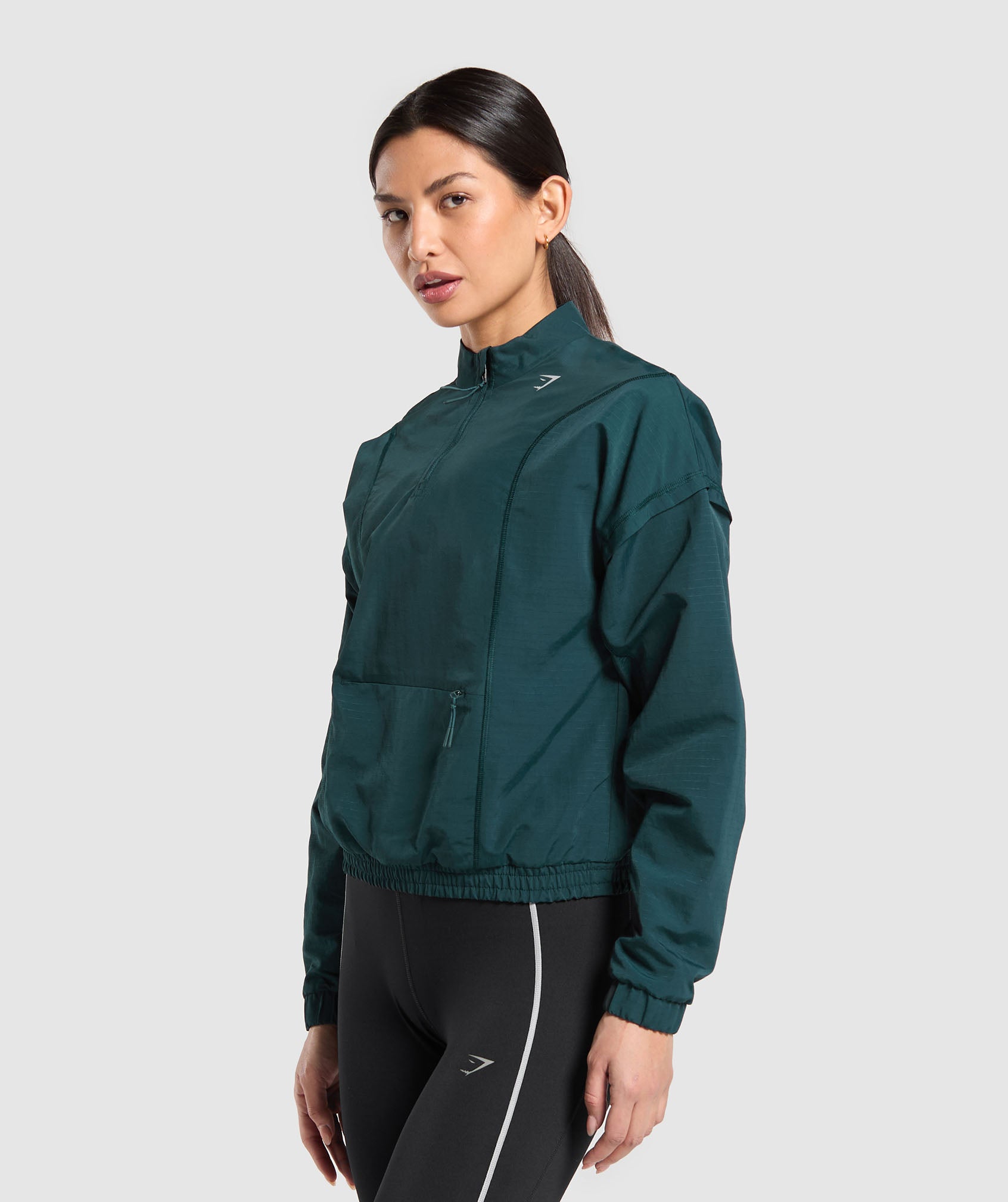 Top deportivo con cremallera de 1/4 para correr