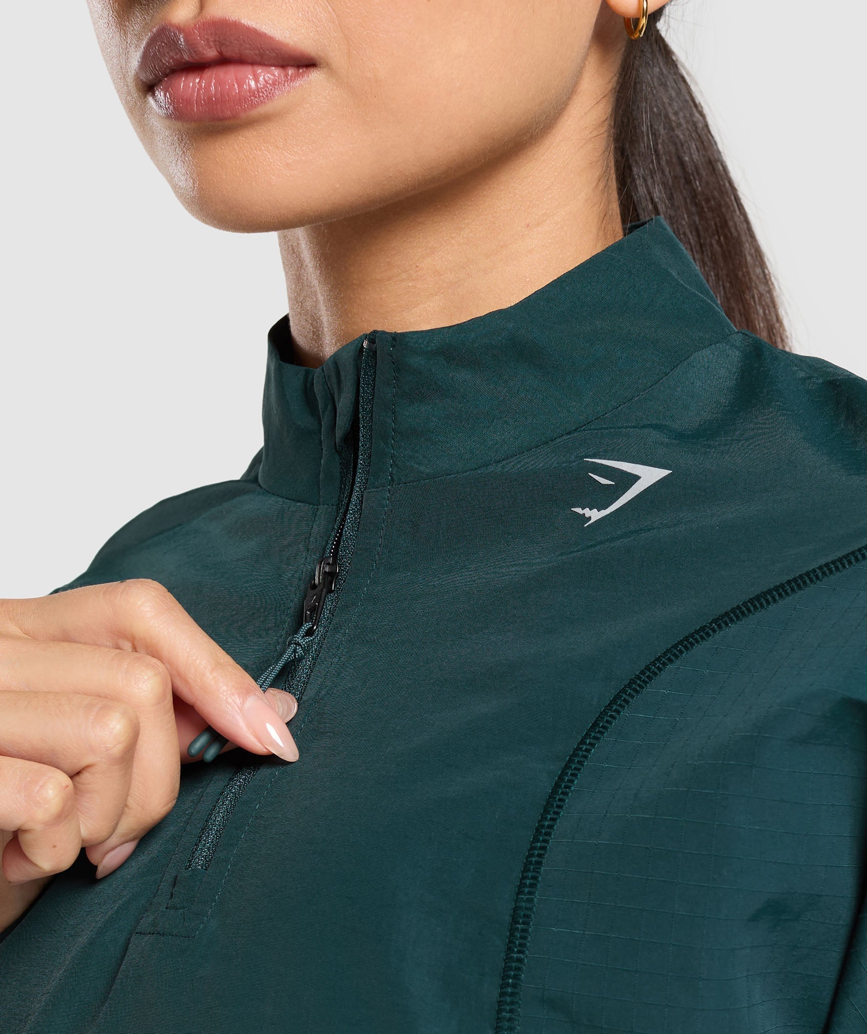 Top deportivo con cremallera de 1/4 para correr